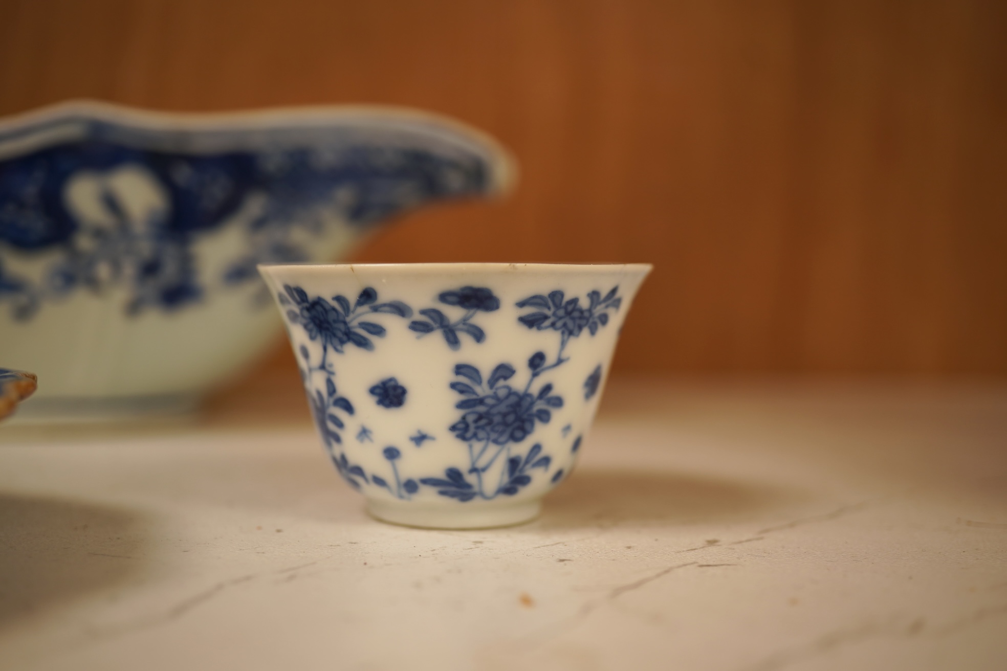 A Chinese export blue and white blue plate, sauceboat and Ko-sometsuke type dish together with a miniature tea bowl and two saucers. Plate 22cm diameter
